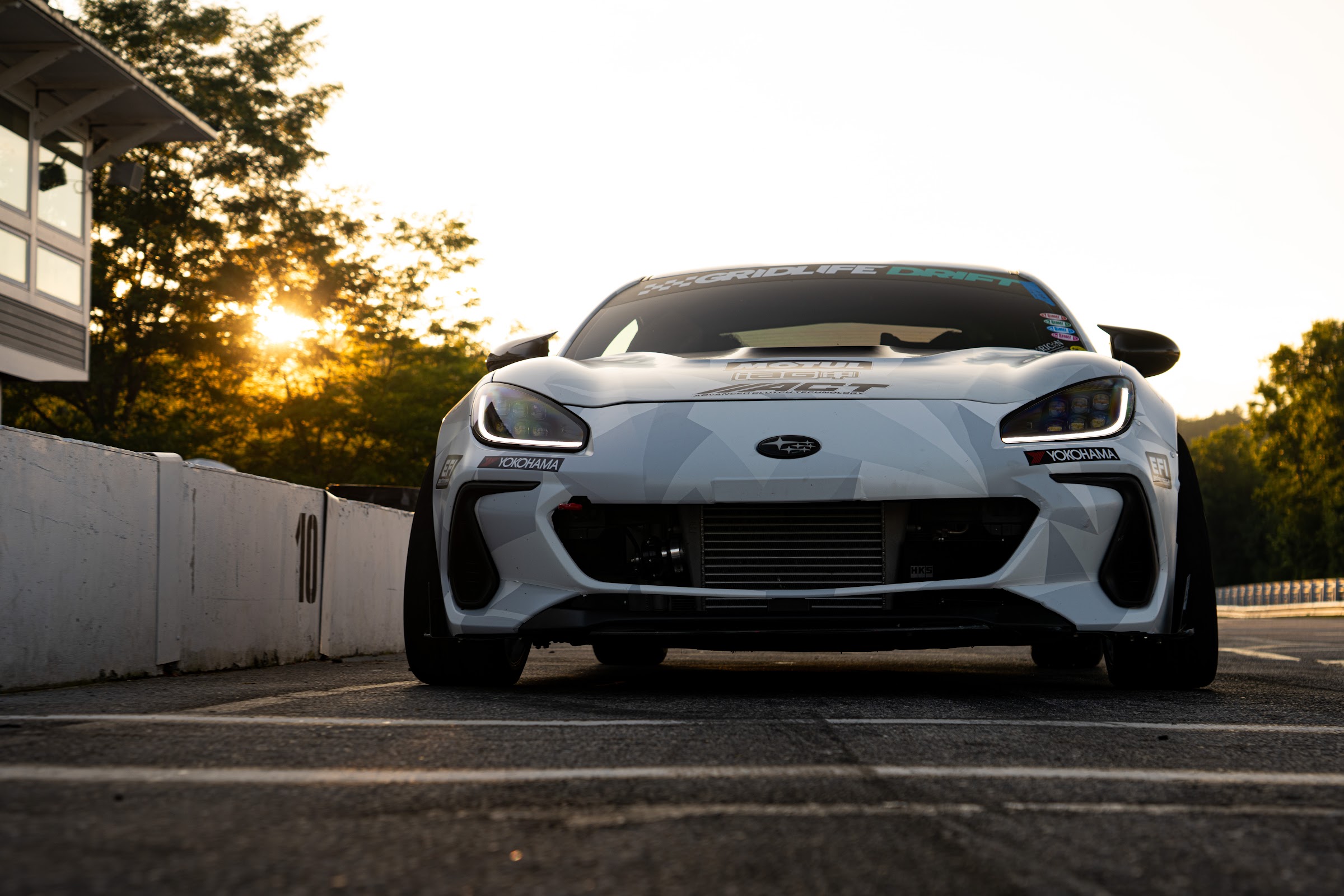 Widebody BRZ head-on into the setting sun
