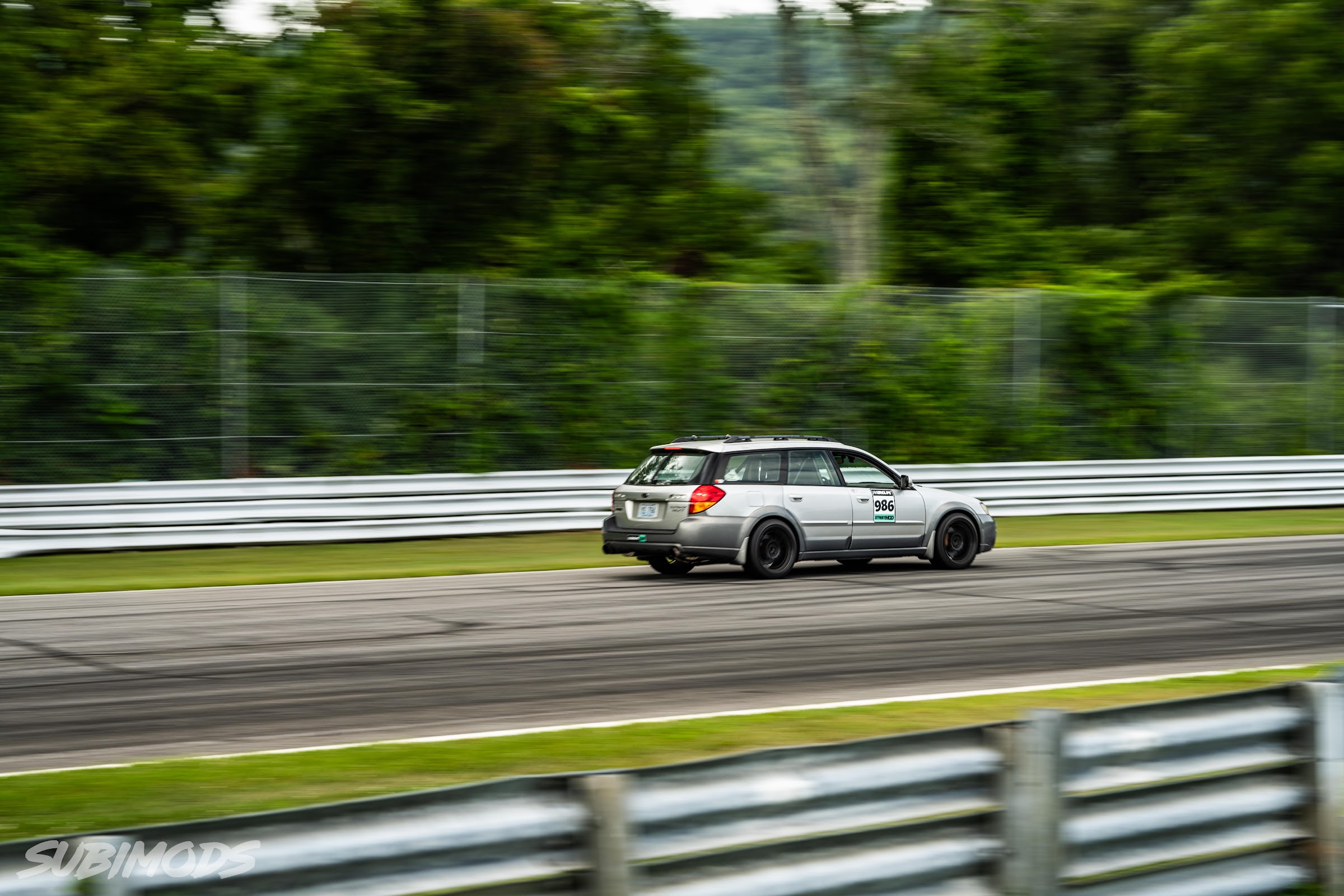 Outback wagon exiting the final corner